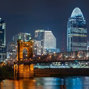 Image of Cincinnati and John A. Roebling suspension bridge at night.